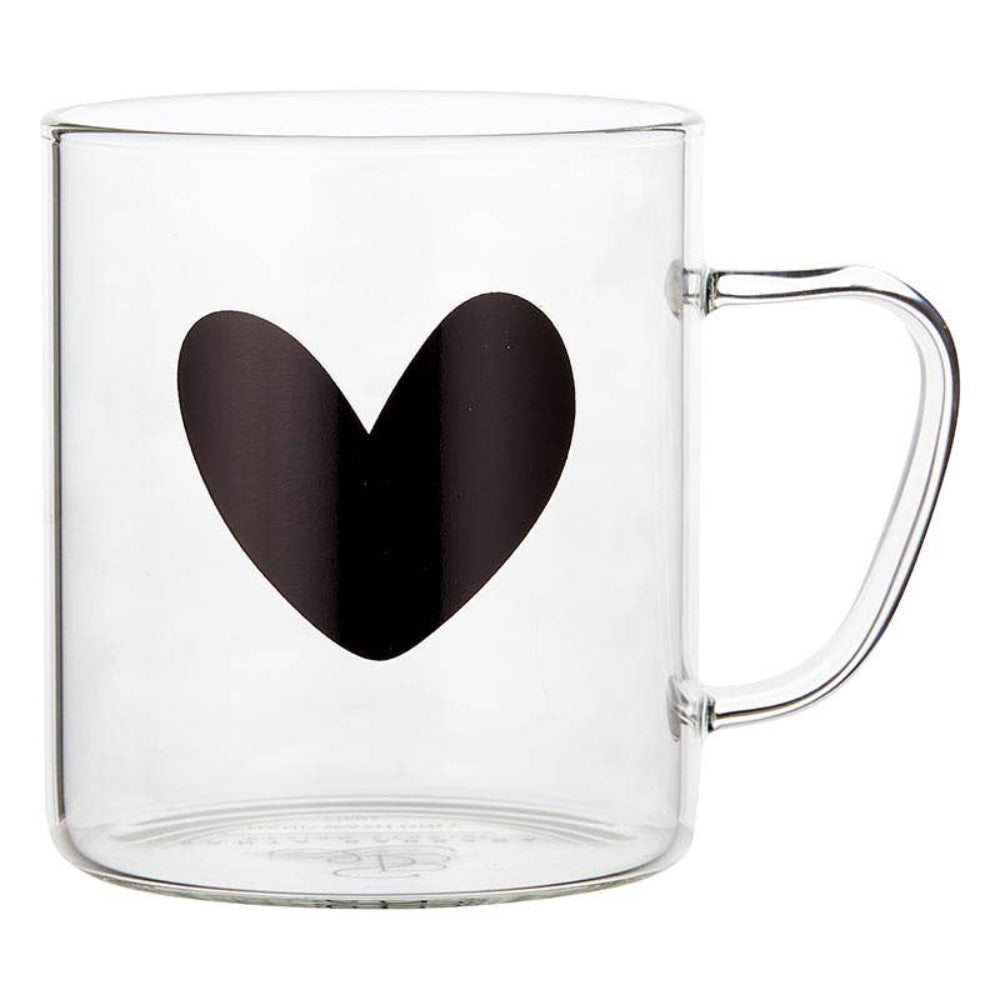 Clear glass mug with a black heart design on a white background