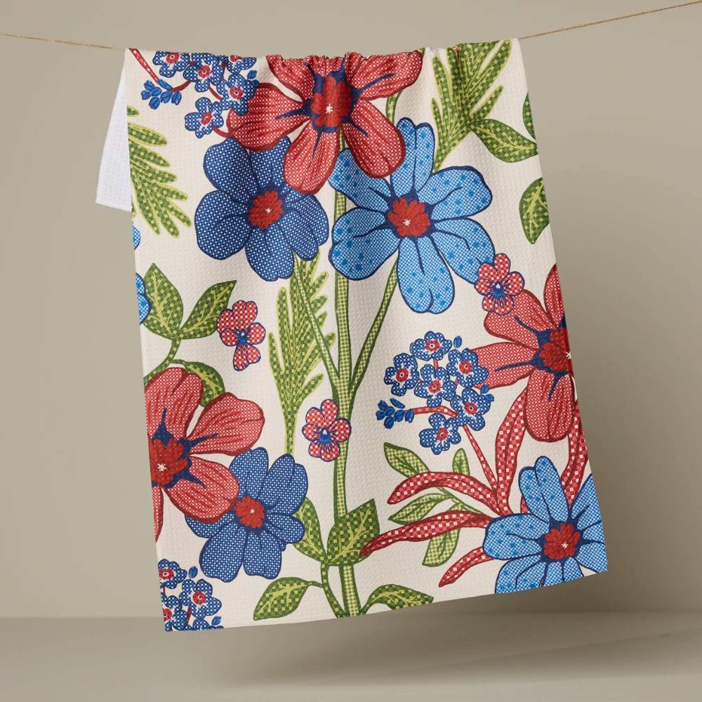 Geometry Tea Towel with blue and redl flowers and green leaves on a white background,