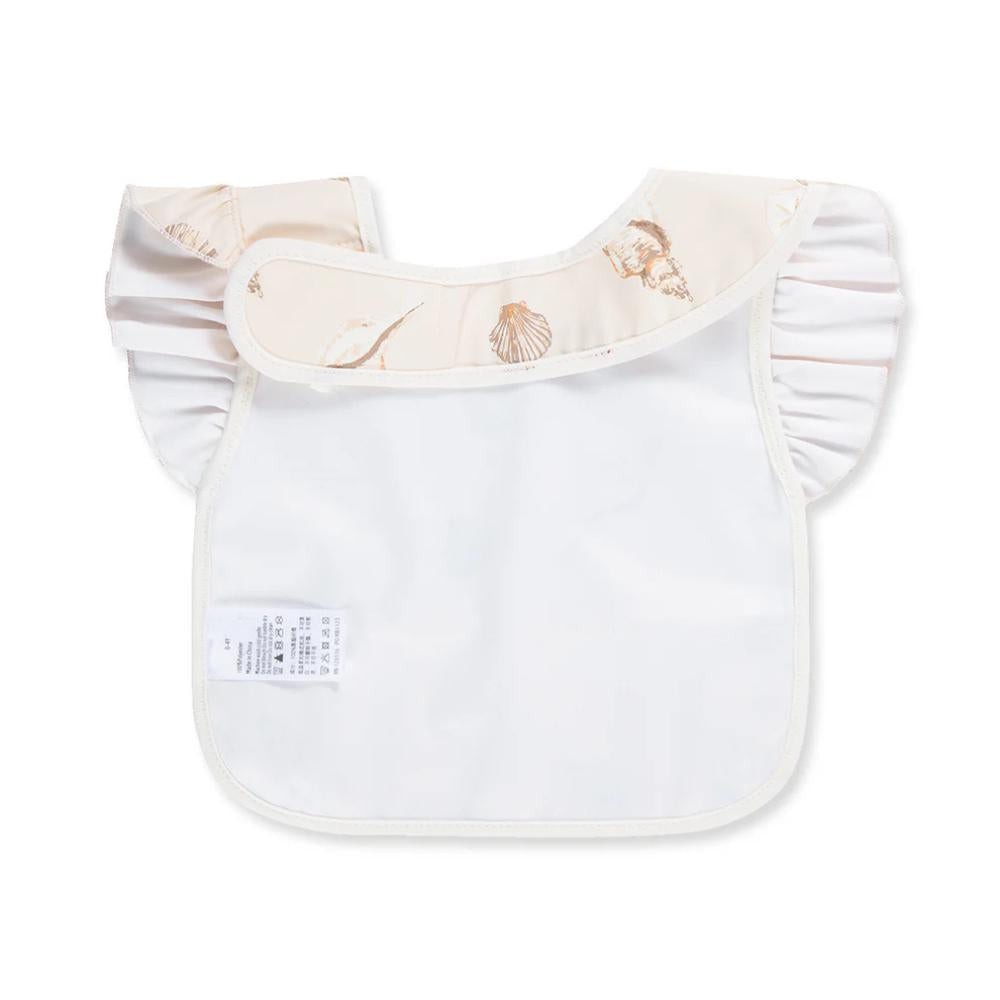 Seashells Ruffle Pocket Bib by Milkbarn