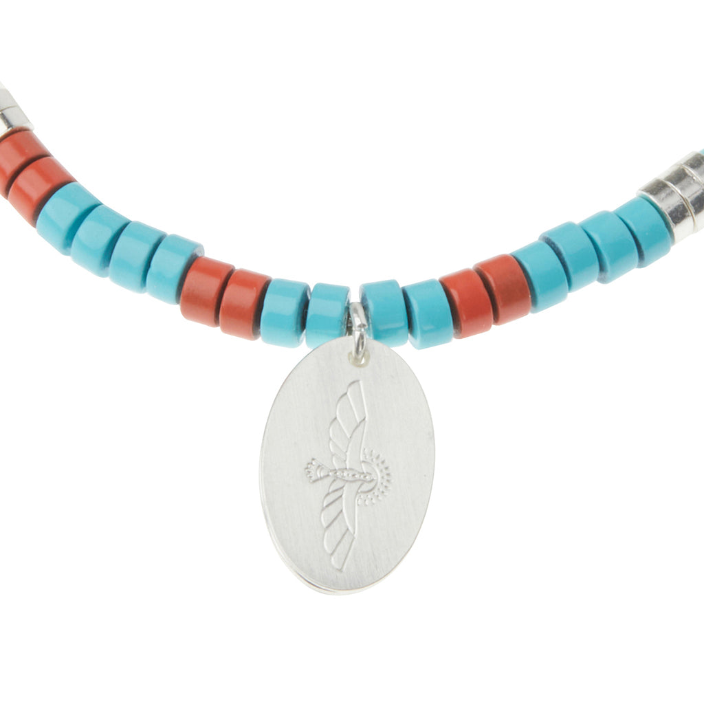 Scout Aqua Terra Charm Bracelet close-up of metal charm featuring the Peace design