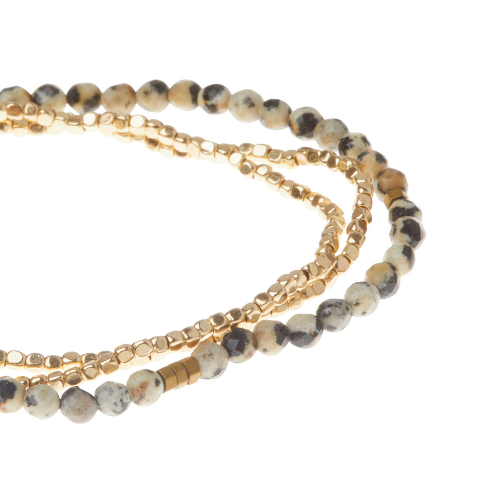 Scout delicate Dalmation Jasper wrap close detail of faceted spotted gemstone beads