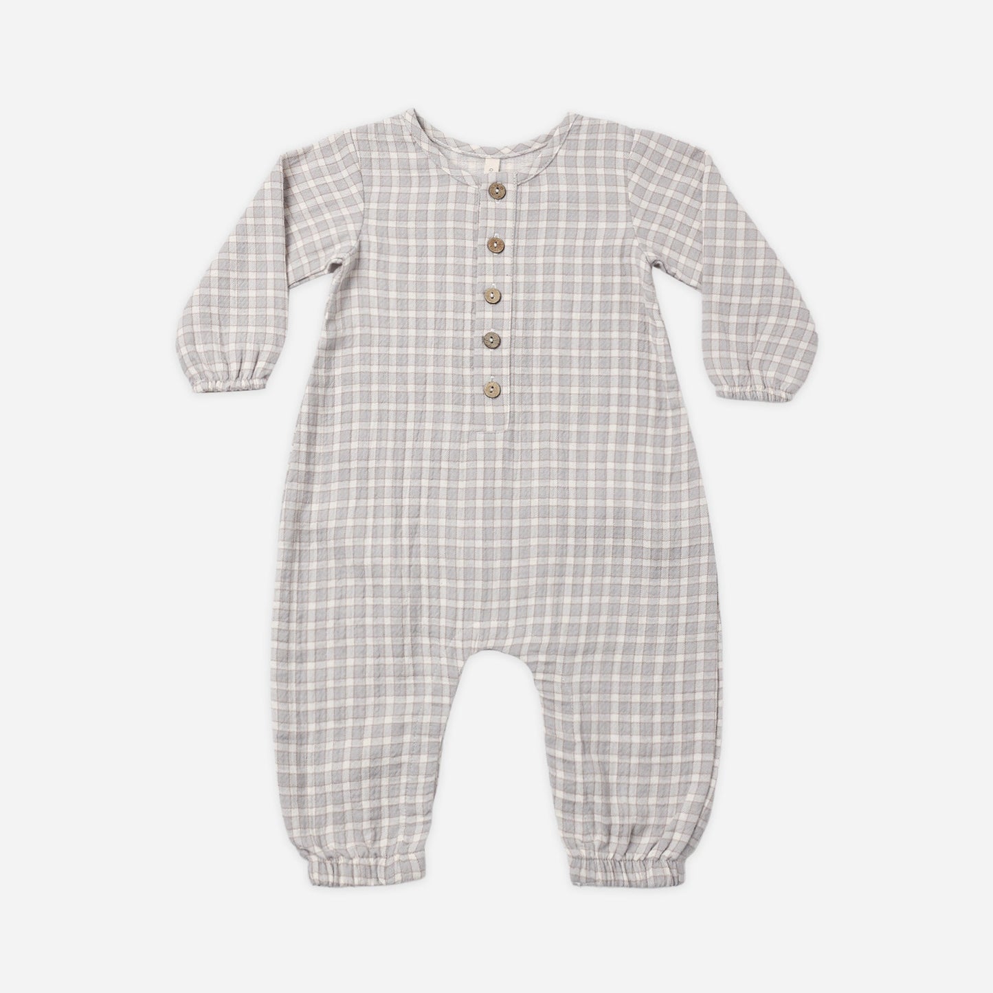 A baby long-sleeve romper in a light blue and white gingham check pattern, featuring a button-up front with wooden buttons.