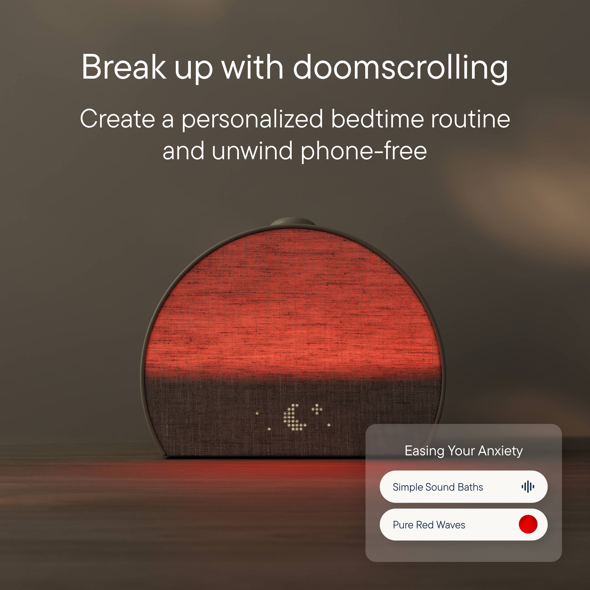 Hatch Restore 3 sunrise alarm clock in putty glowing with warm sunrise light