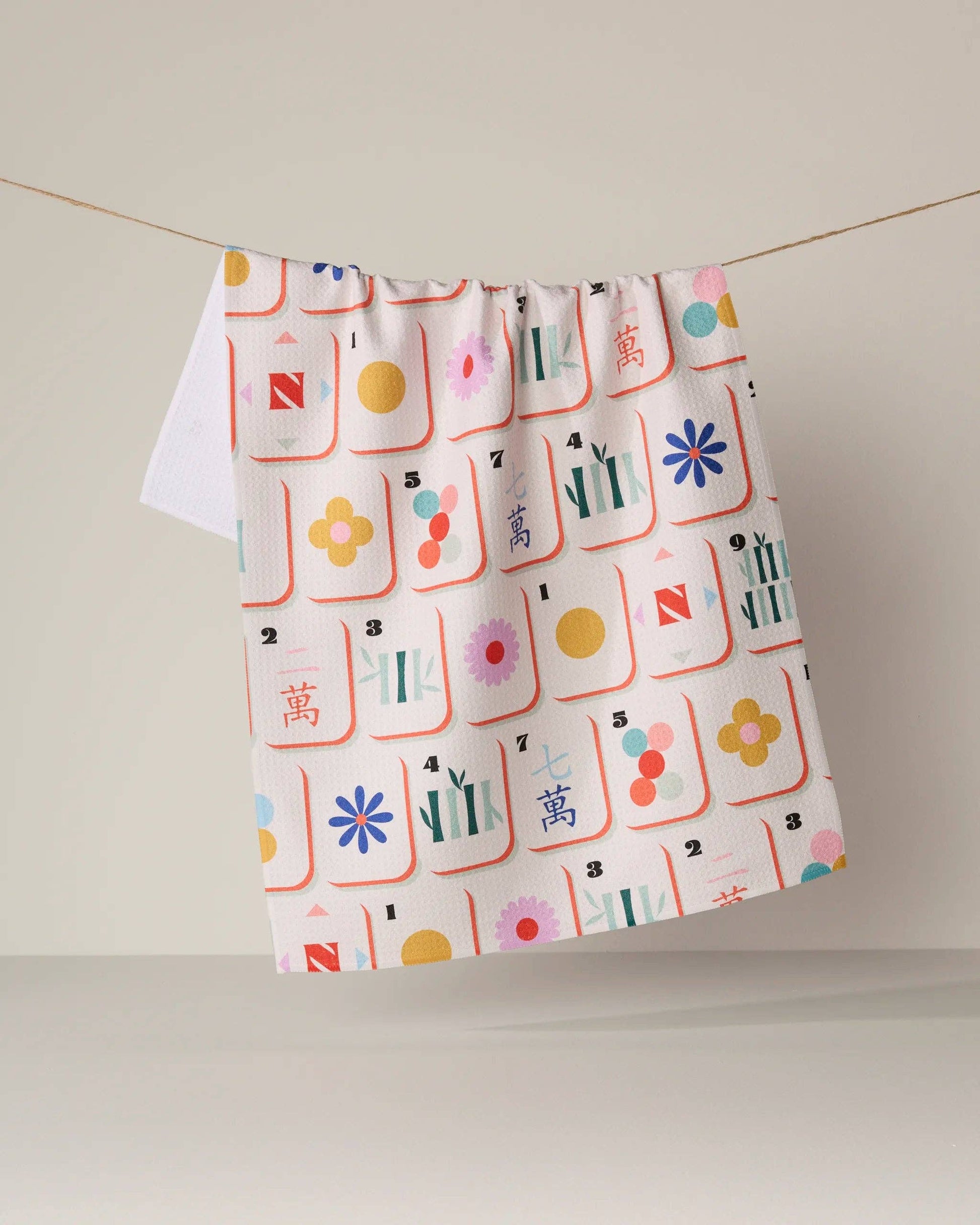 Geometry Tile Toss Tea Towel with mahjong tile print