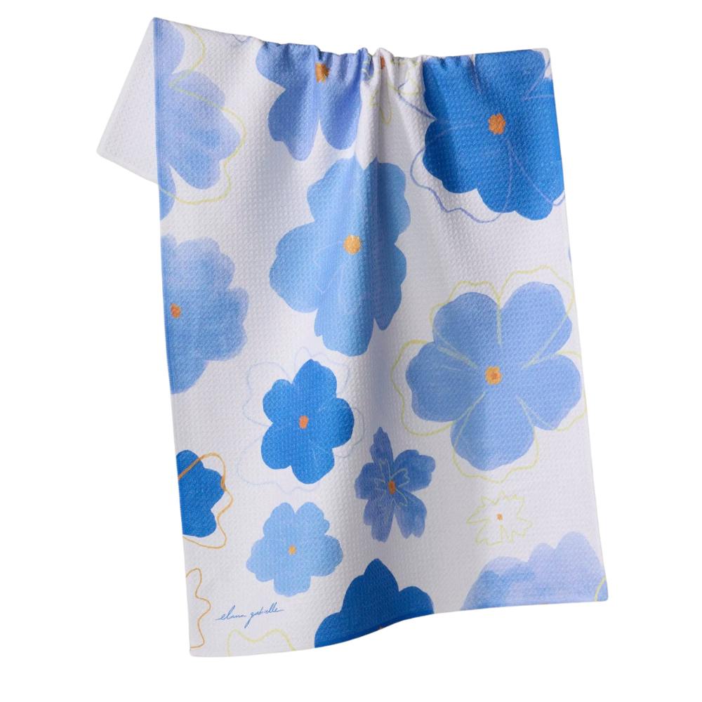 Floral patterned tea towel by Geometry with blue flowers on a white background