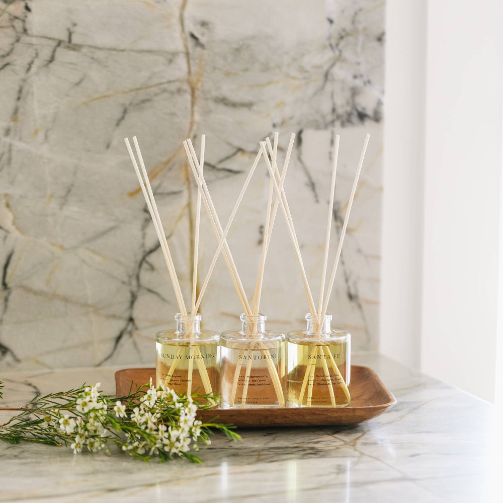 Brooklyn Candle Studio reed diffuser collection on a marble surface