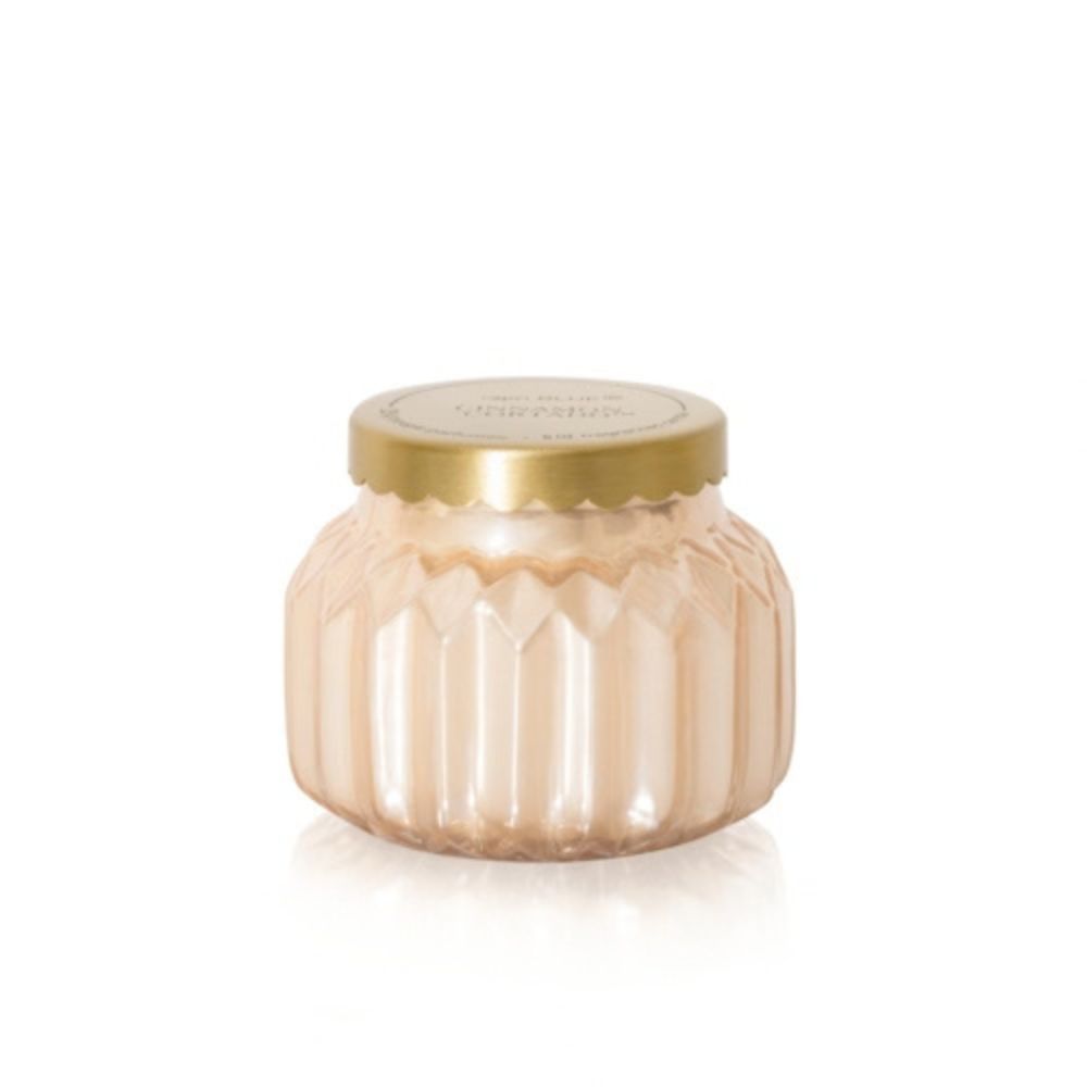 Capri Blue Cinnamon Cortado Royal Gem petite candle in a faceted jar with a gold lid