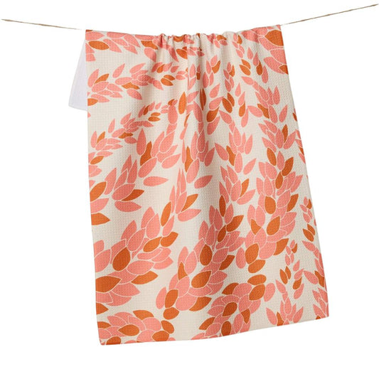 Geometry Tea Towel with a leaf pattern in pink and orange on a white background