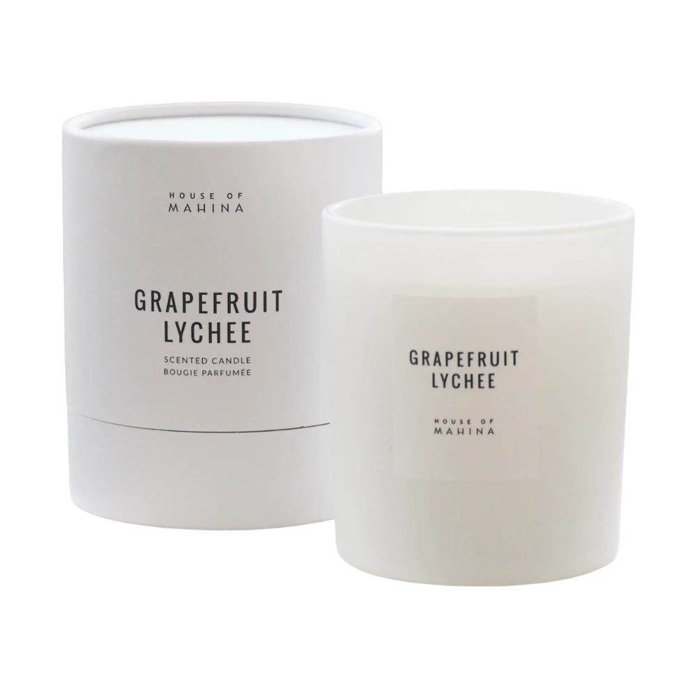 Grapefruit lychee candle with round candle box in studio setting  