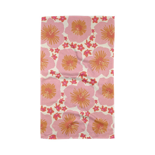 Floral patterned Geometry Tea Towel with pink and orange flowers on a white background