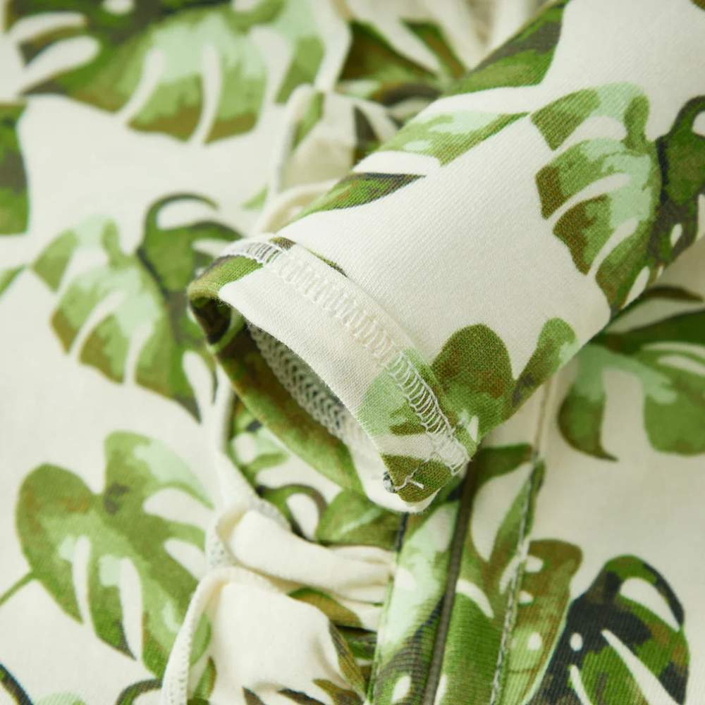 Island Leaf Cotton Stretch Ruffle Romper by Milkbarn