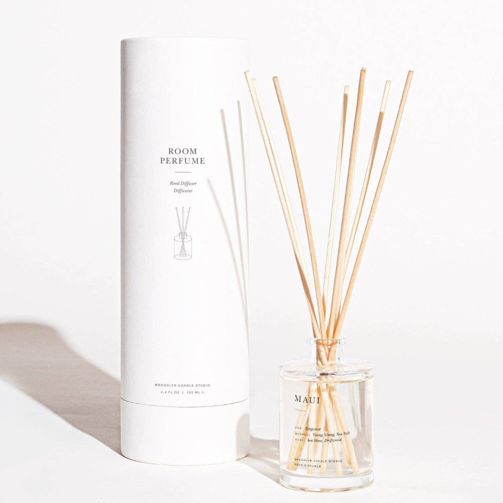 Brooklyn Candle Studio Maui reed diffuser bottle with rattan reeds on white