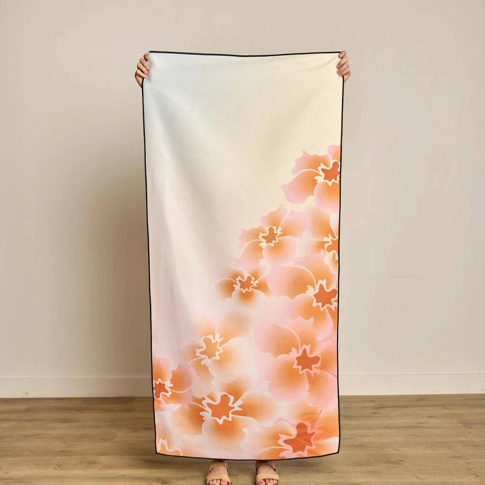 Person holding Nicole Beach Towel from Geometry