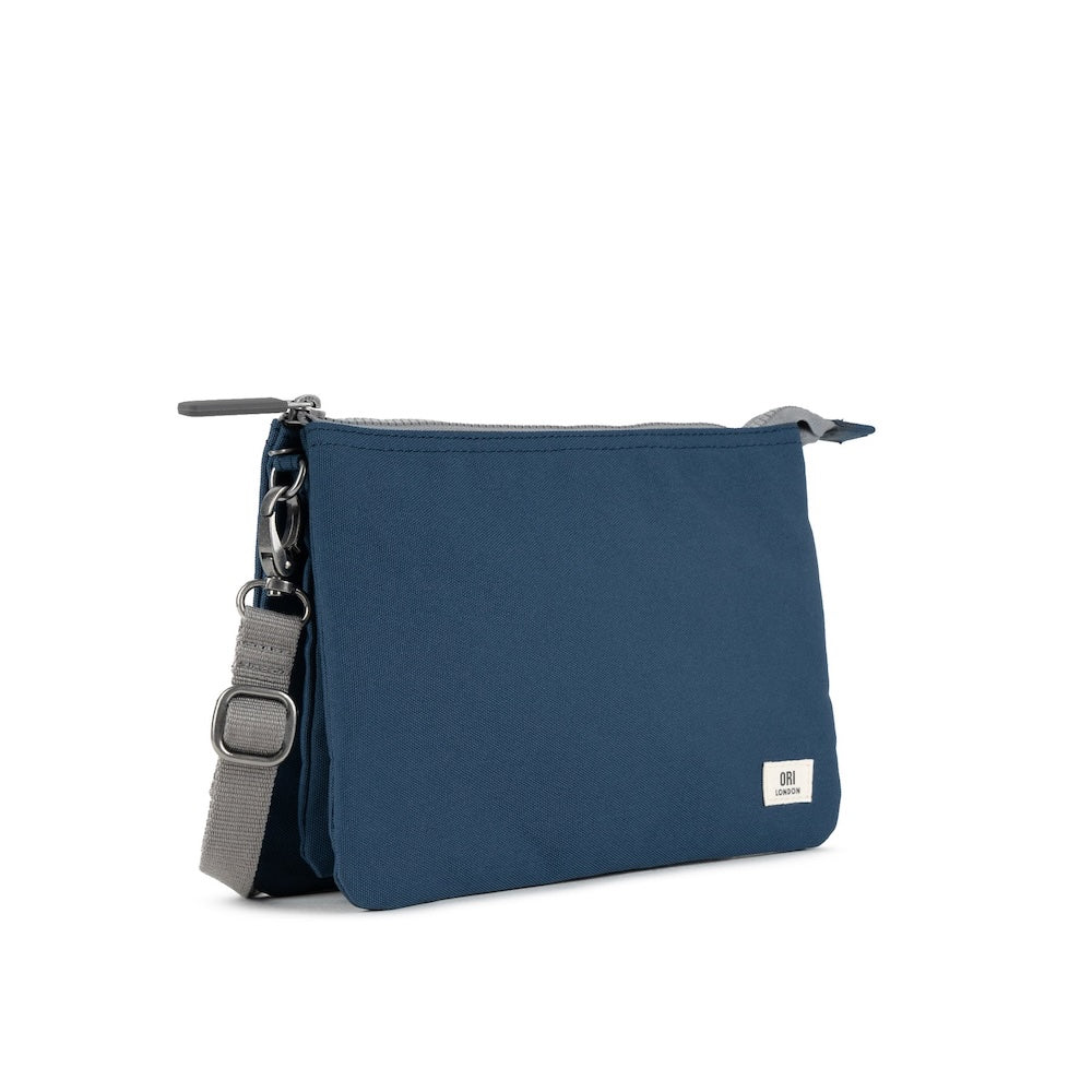 Angle studio view of ORI Carnaby bag in Deep Blue