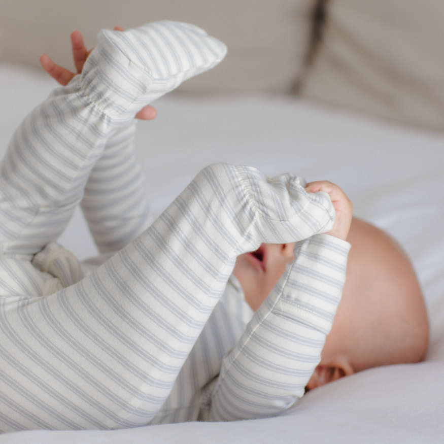 Quincy Mae Cloud Stripe Zip Sleeper Footie in organic brushed jersey, second styled lifestyle photo