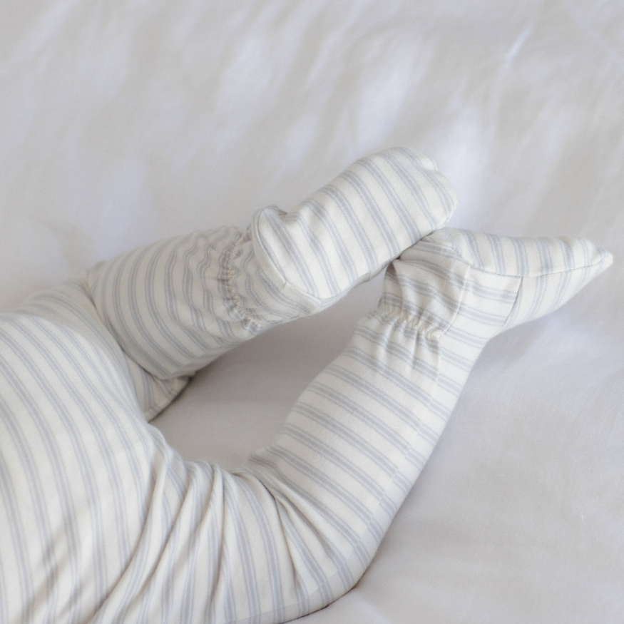 Quincy Mae Cloud Stripe Zip Sleeper Footie in organic brushed jersey, third styled lifestyle photo