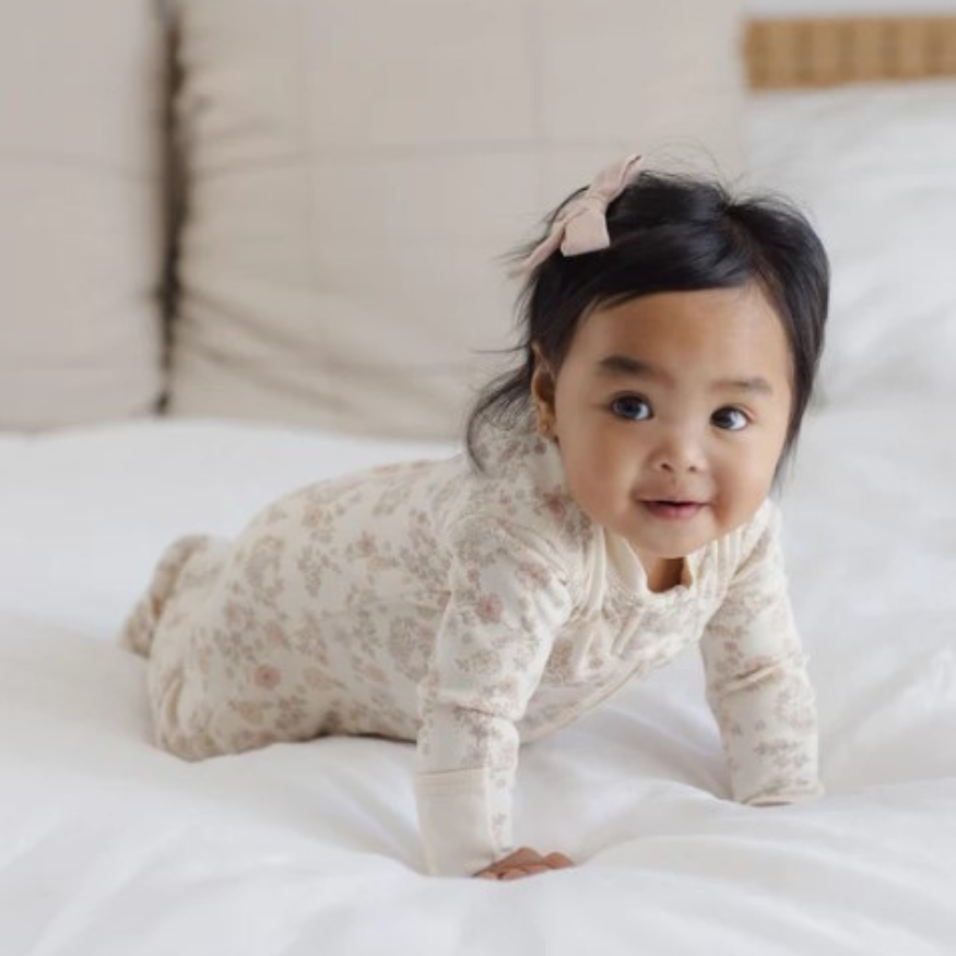 Quincy Mae Floral Vine Zip Sleeper Footie in organic brushed jersey, second styled lifestyle photo