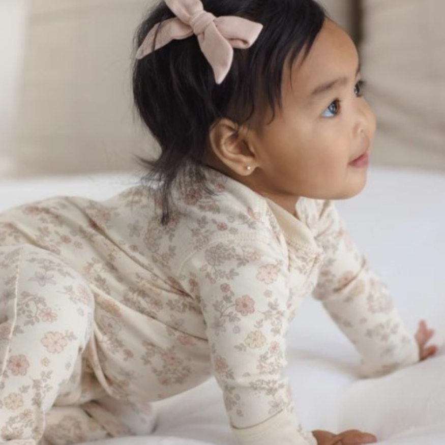 Quincy Mae Floral Vine Zip Sleeper Footie in organic brushed jersey, third styled lifestyle photo