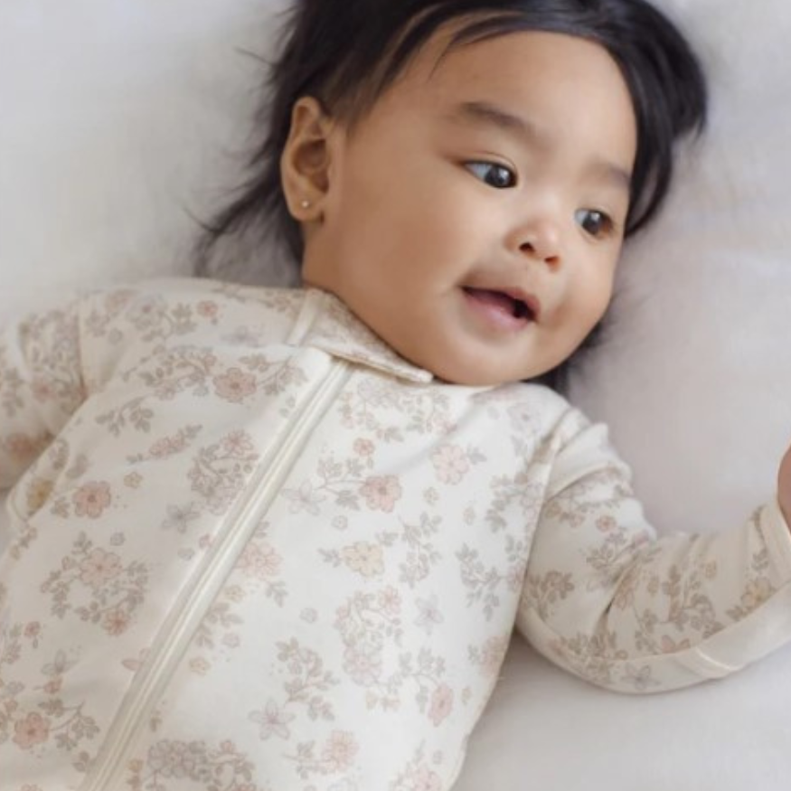 Quincy Mae Floral Vine Zip Sleeper Footie in organic brushed jersey, fourth styled lifestyle photo