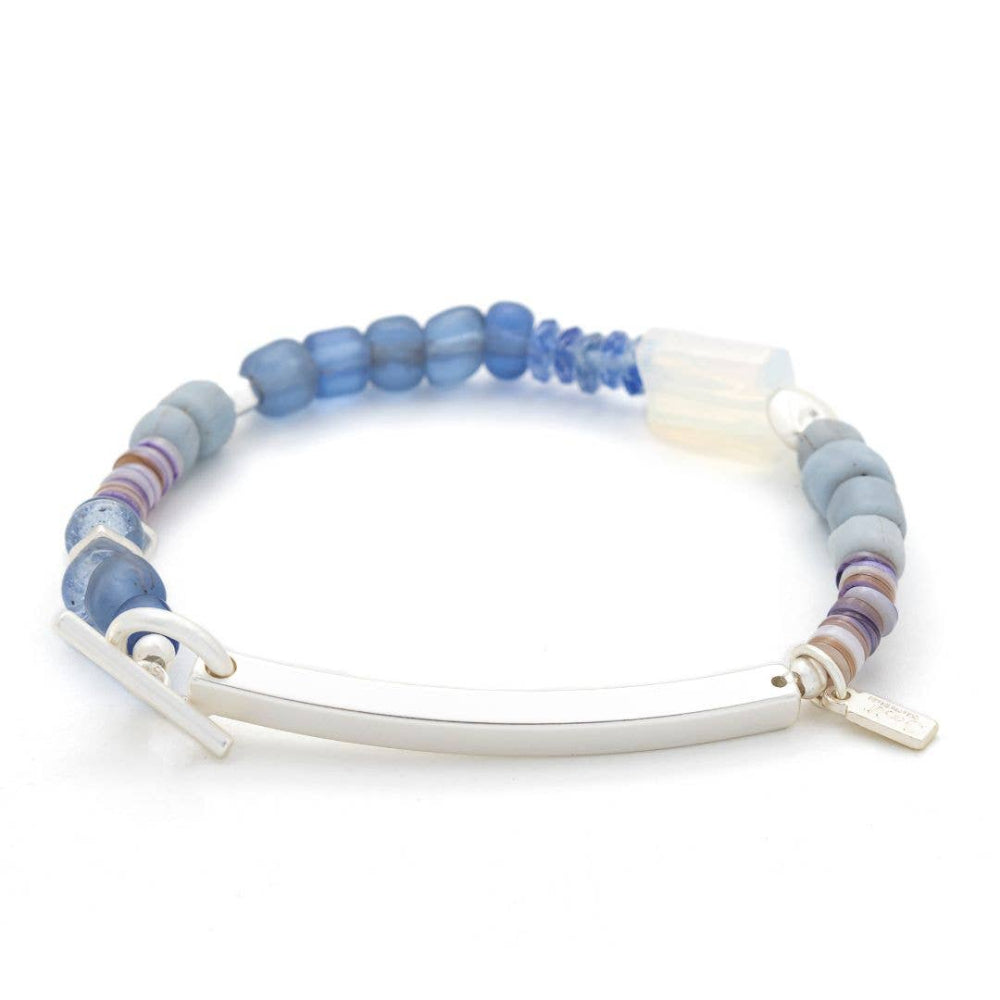 Bracelet with various color blue and white beads and silver message bar