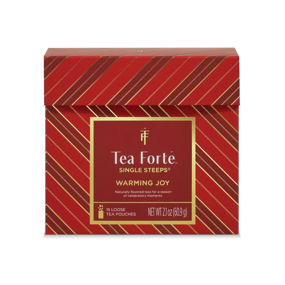Front of the Tea Forte Warming Joy Single Steeps Sampler, a red striped box with a gold framed label