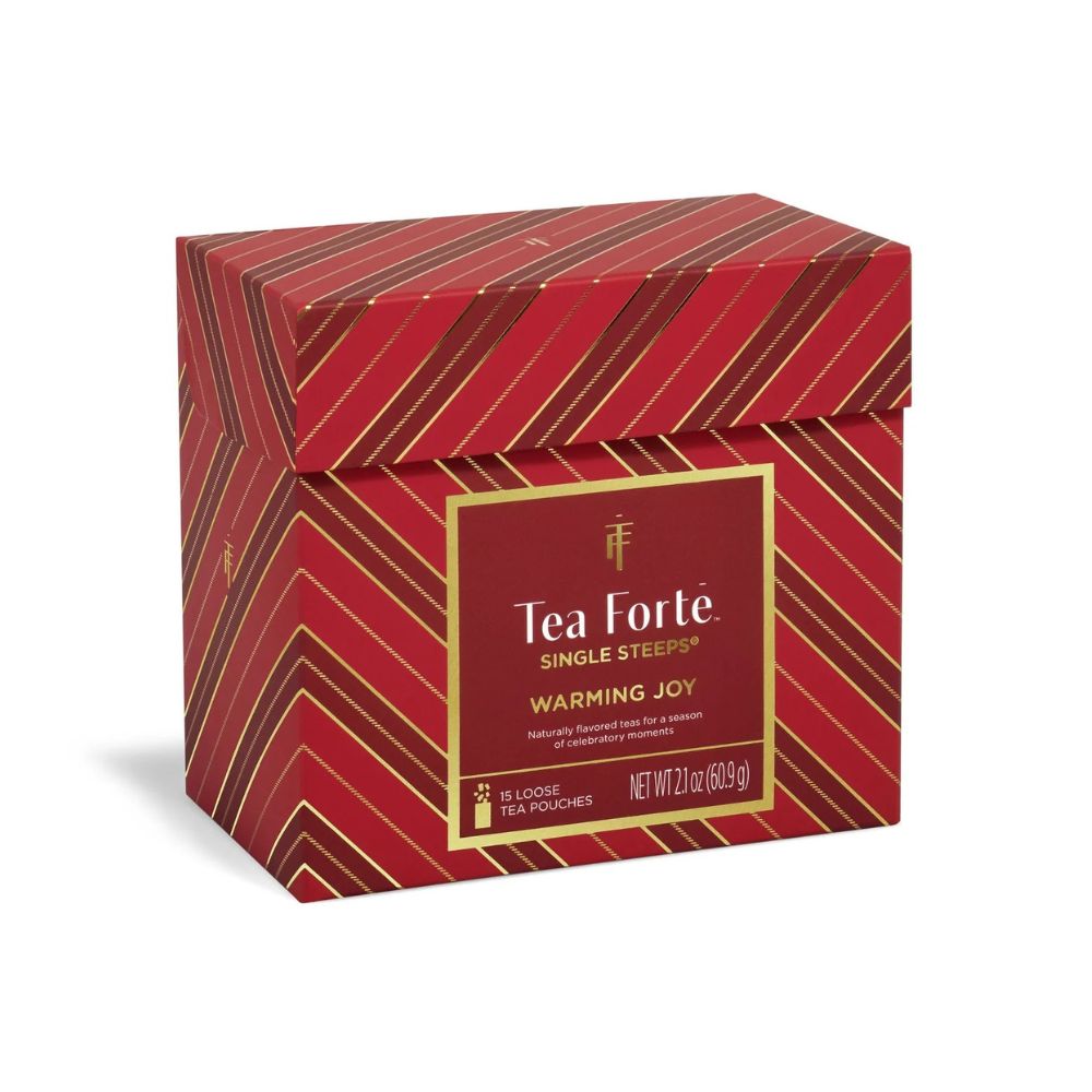 Three quarter view of the red striped Tea Forte Warming Joy Single Steeps Sampler box