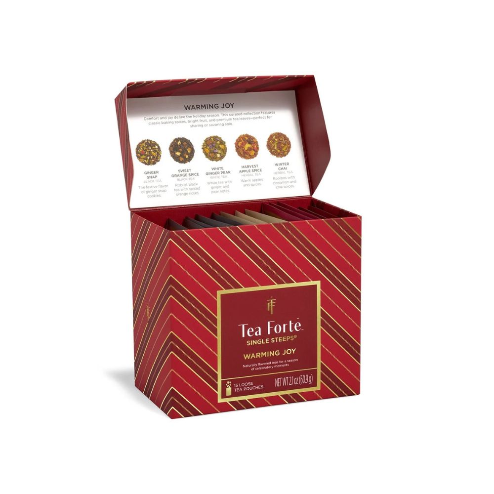 Tea Forte Warming Joy Single Steeps Sampler box with the lid open showing the tasting card inside