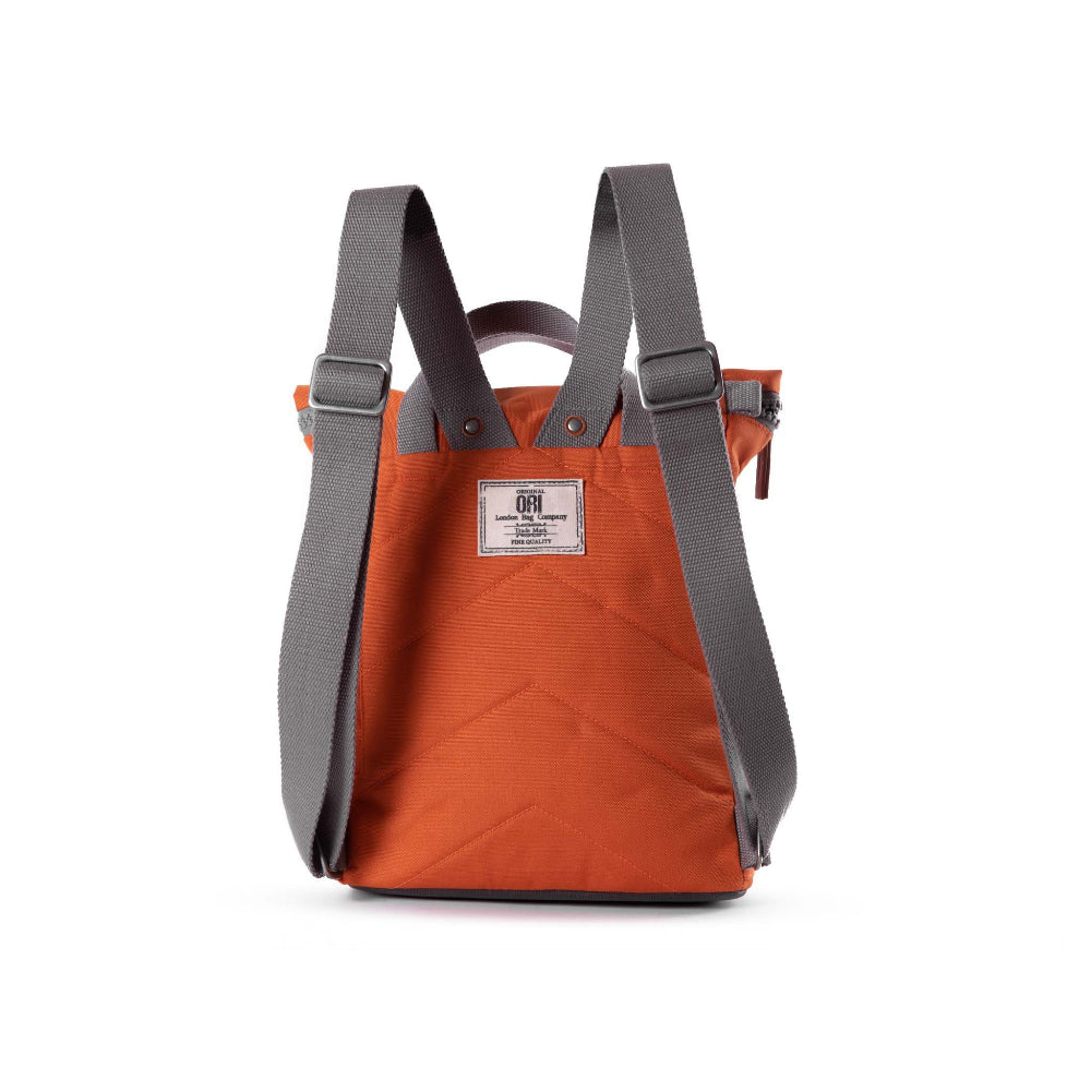 ORI London Atomic Orange Finchley backpack in recycled canvas with padded laptop sleeve and roll-top closure