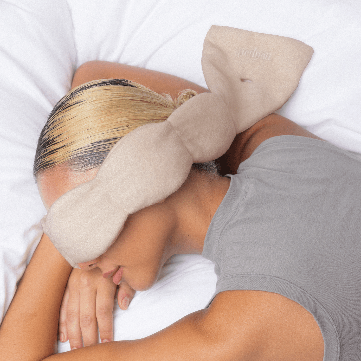 Nodpod Latte weighted sleep mask shown reversible, jersey cotton side and microfleece side