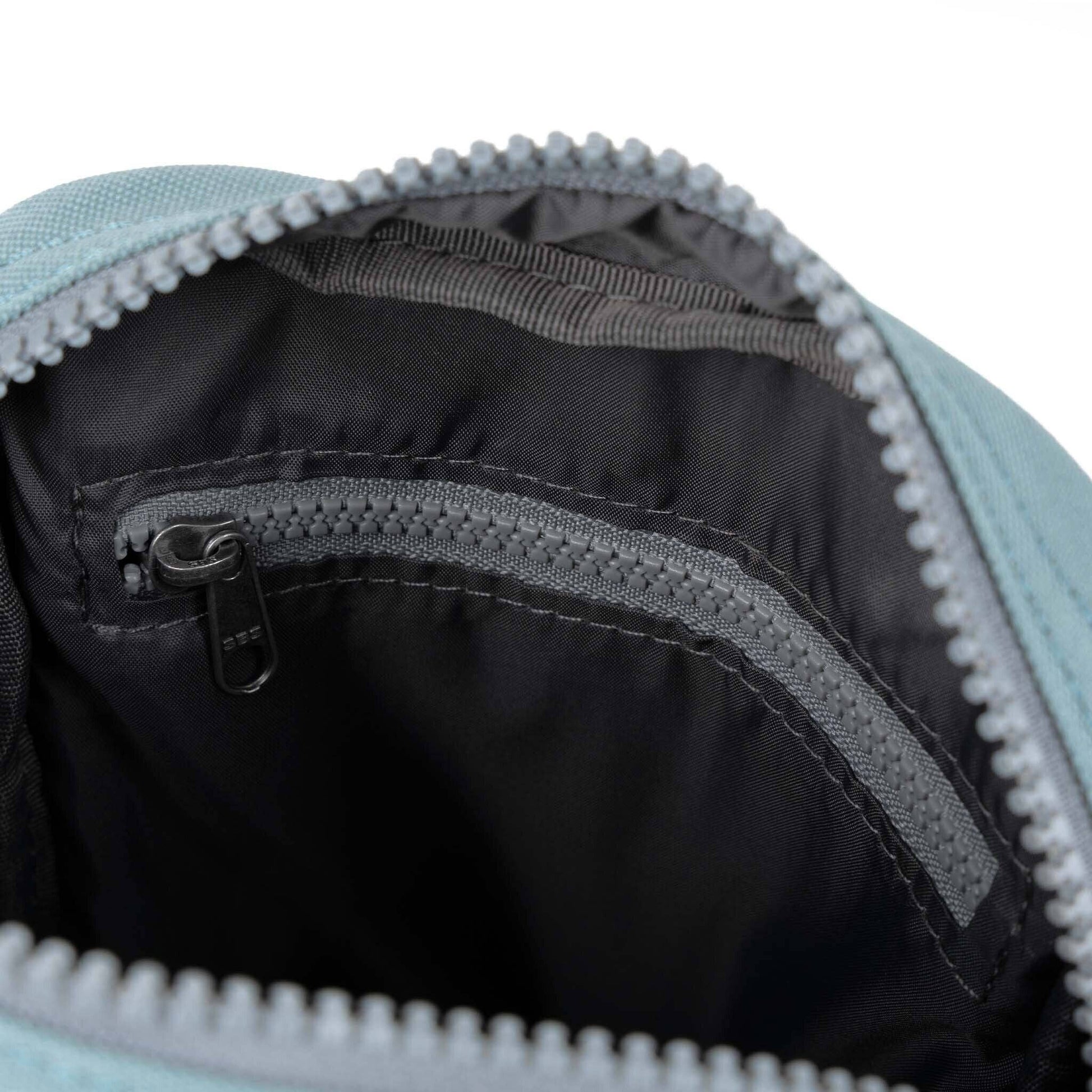 ORI London London Fog Bond crossbody in recycled canvas with outer zip pocket and adjustable strap