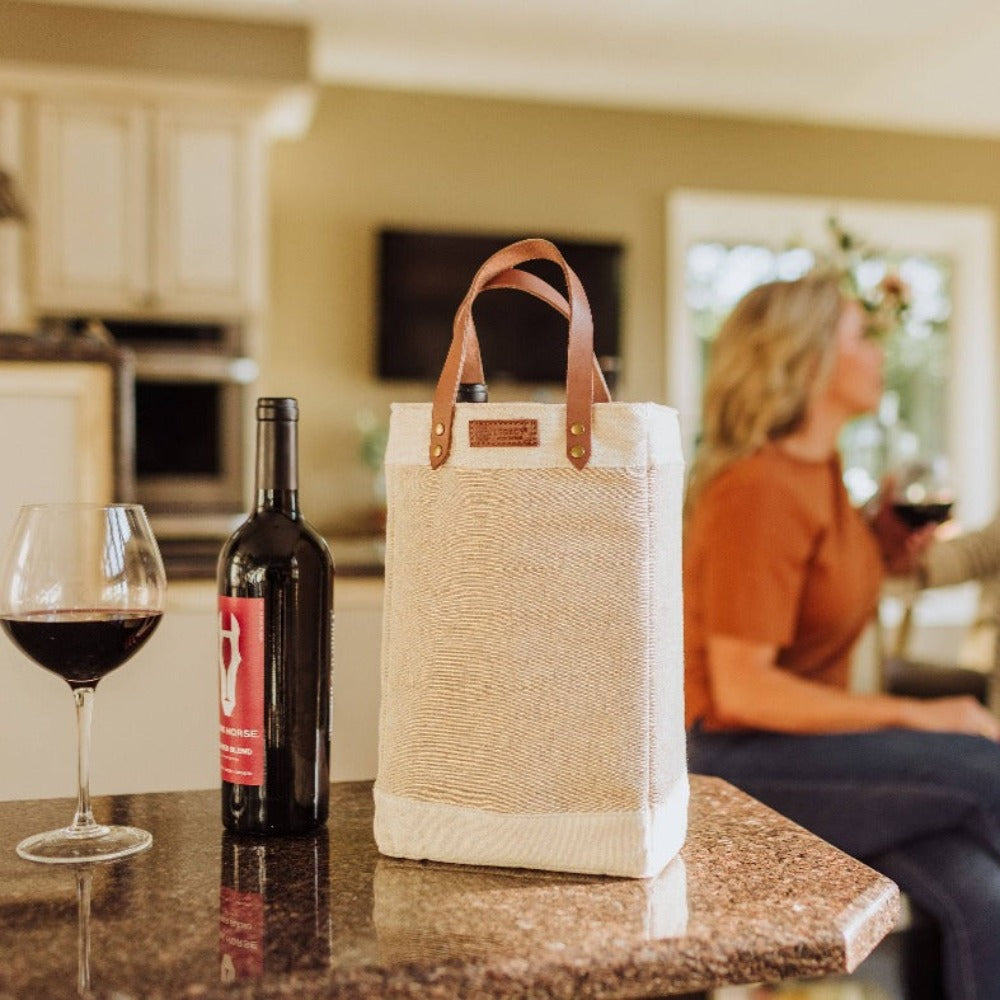 Pinot Jute Beige colored 2 Bottle Insulated Wine Bag on countertop 