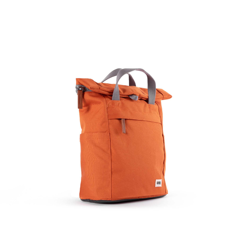 ORI London Atomic Orange Finchley backpack in recycled canvas with padded laptop sleeve and roll-top closure