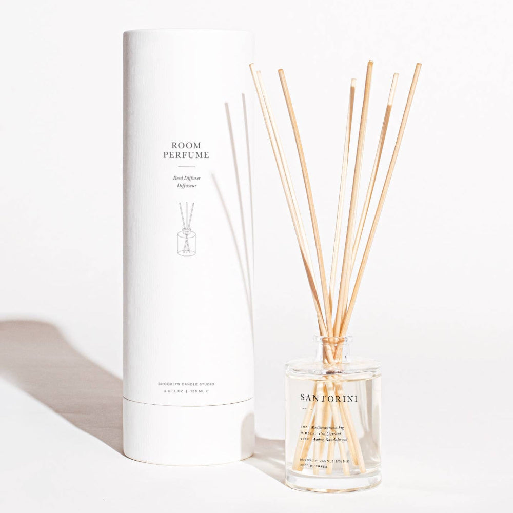 Brooklyn Candle Studio Santorini reed diffuser bottle with rattan reeds on white