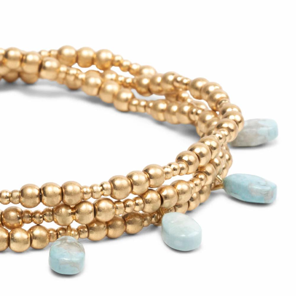 Scout Gold and Blue Howlite Timeless Wrap close-up of gold beads with blue stone accent