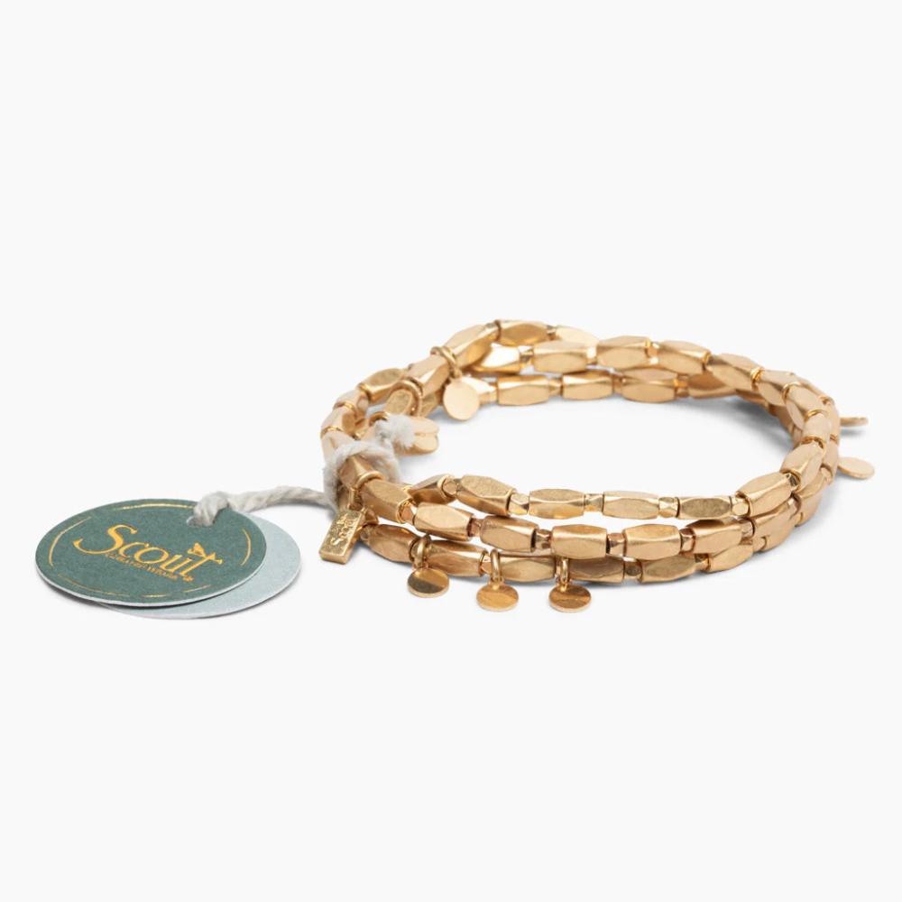 Scout Gold Iconic Disc Metal Wrap close-up of flat disc-shaped brass beads