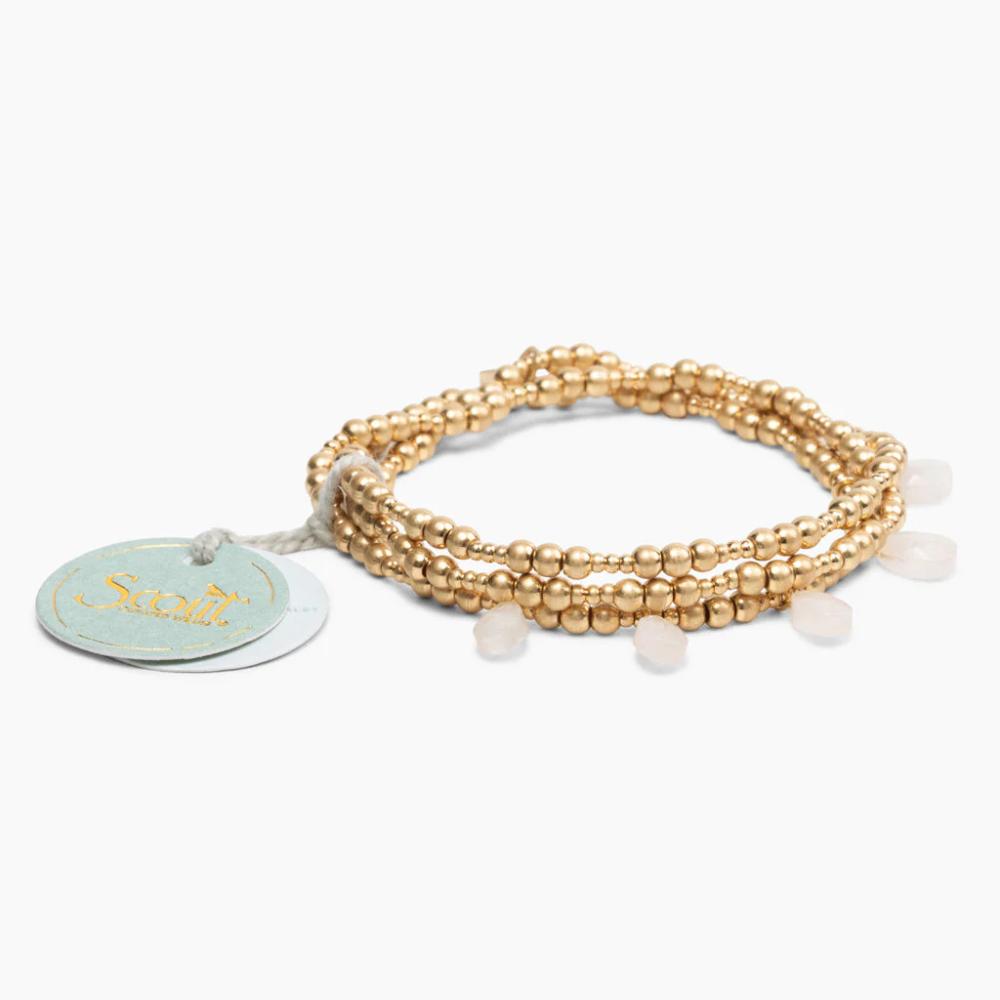 Scout Gold and Rose Quartz Timeless Wrap shown with Scout brand tag and packaging