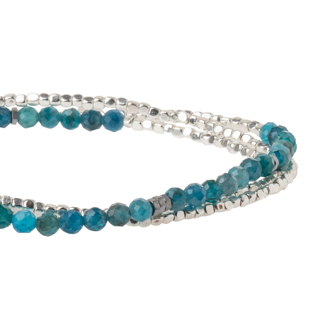 Scout delicate Apatite wrap close detail of faceted teal-blue gemstone beads