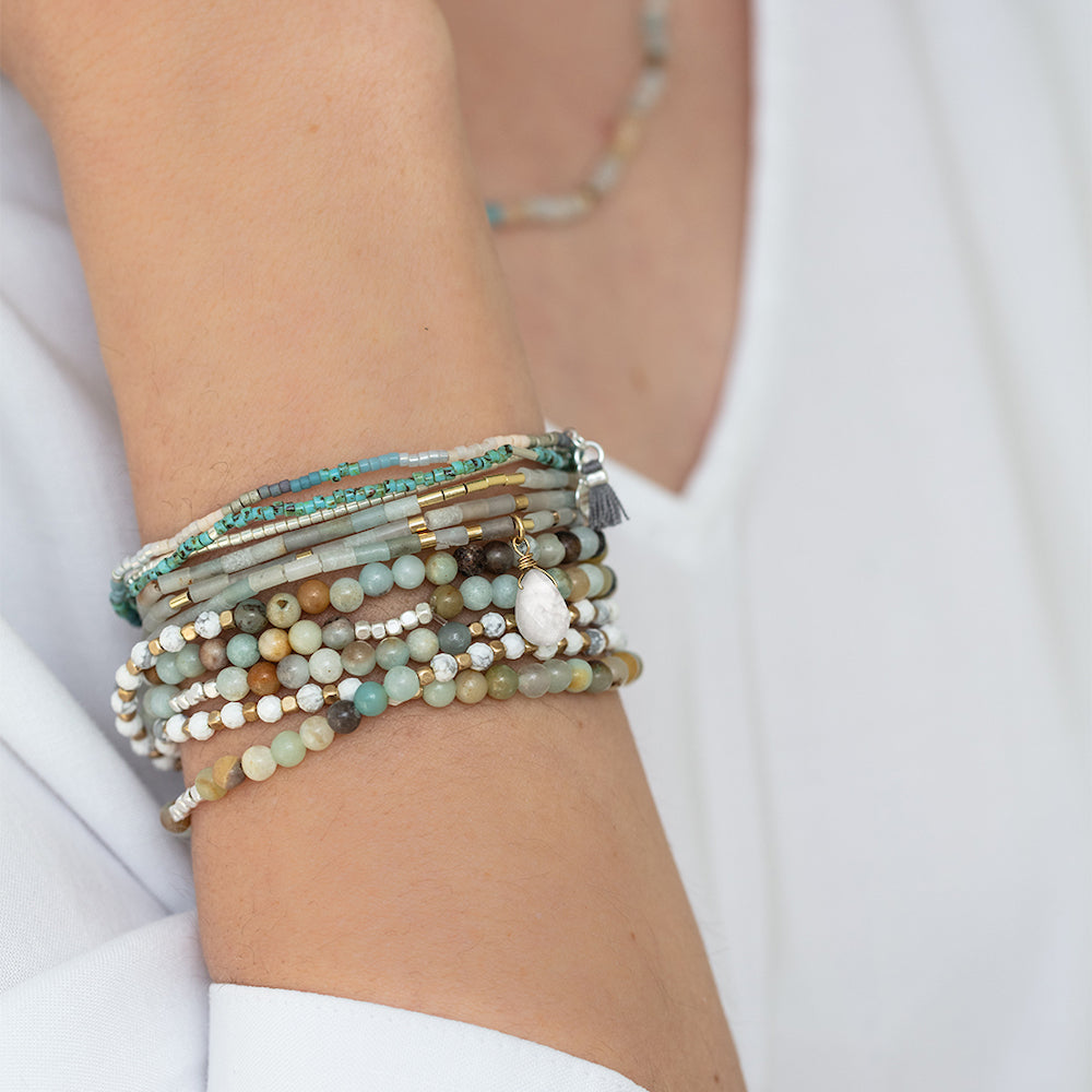 Scout Aqua Terra and Sunstone Teardrop Wrap modeled in editorial lifestyle styling