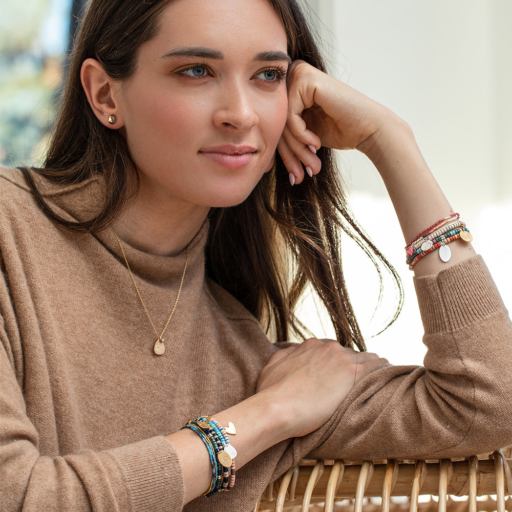 Scout Blue Howlite and Sunstone Teardrop Wrap modeled in editorial lifestyle styling