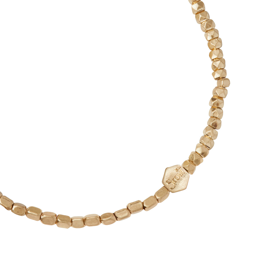 Scout Gold Mini Metal Stacking Bracelet close-up detail of geometric beads