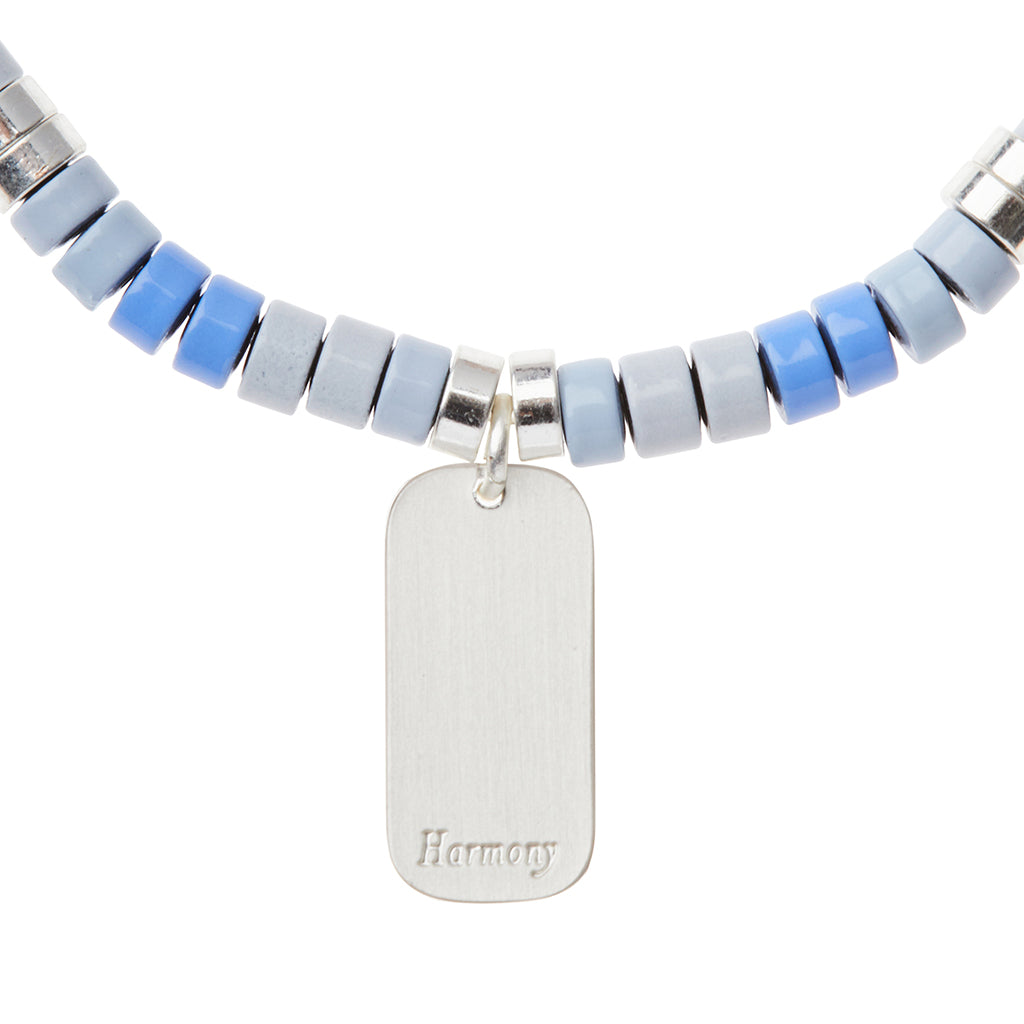 Scout Howlite Charm Bracelet close-up of metal charm reverse side