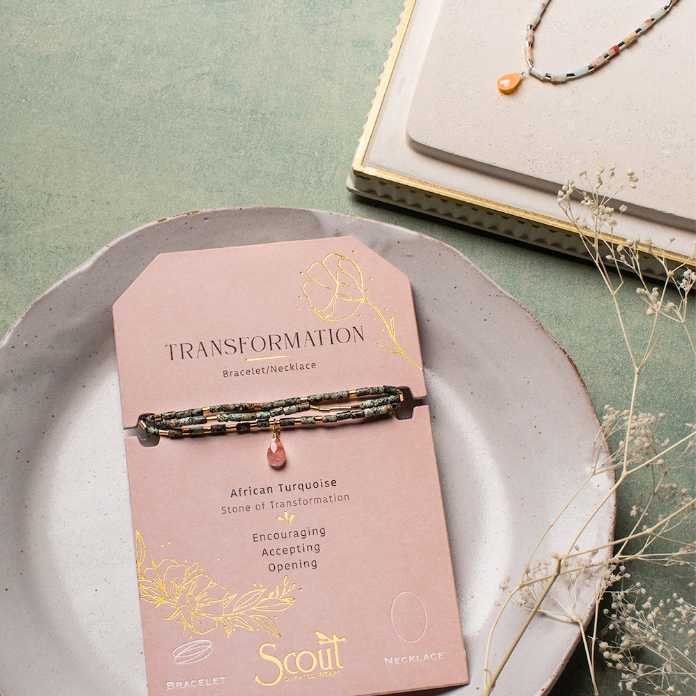 Scout Labradorite and Fuschia Teardrop Wrap modeled in editorial lifestyle styling