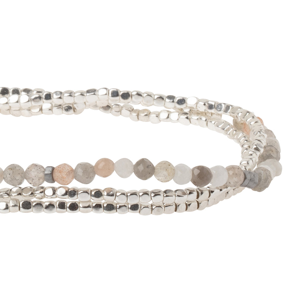 Scout delicate Moonstone wrap close detail of faceted gemstone beads with blue-white sheen