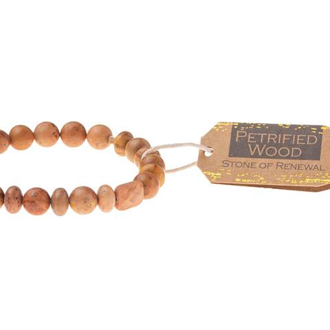 Scout Petrified Wood Stone of Renewal bracelet shown stacked on the wrist