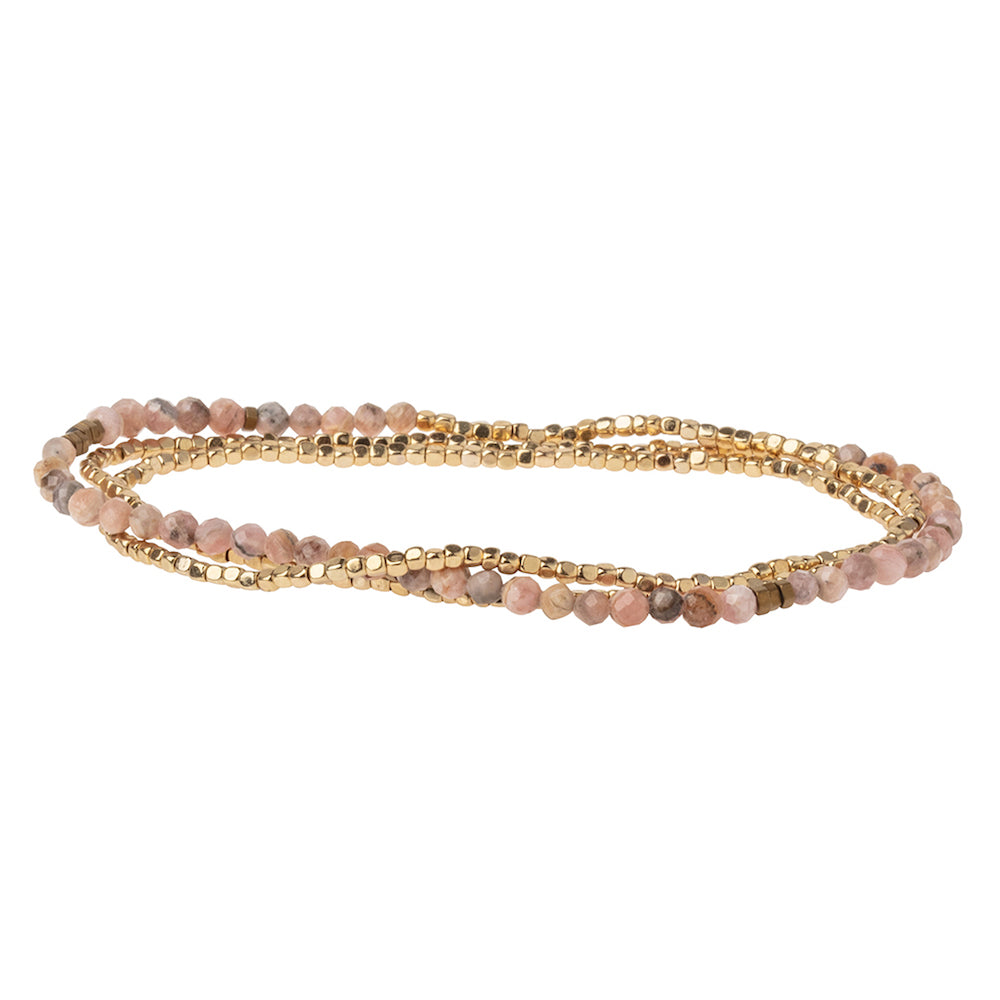 Scout delicate Rhodochrosite wrap in faceted pink stone beads, Stone of Love