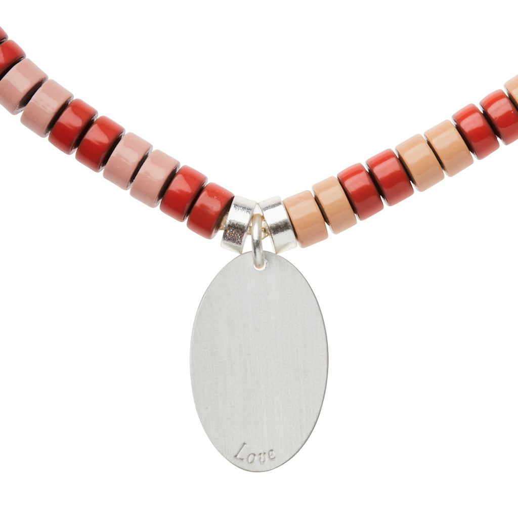 Scout Rose Quartz Charm Bracelet close-up of metal charm reverse side