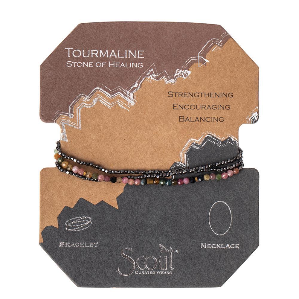Scout delicate Tourmaline Stone of Healing wrap worn layered at the wrist